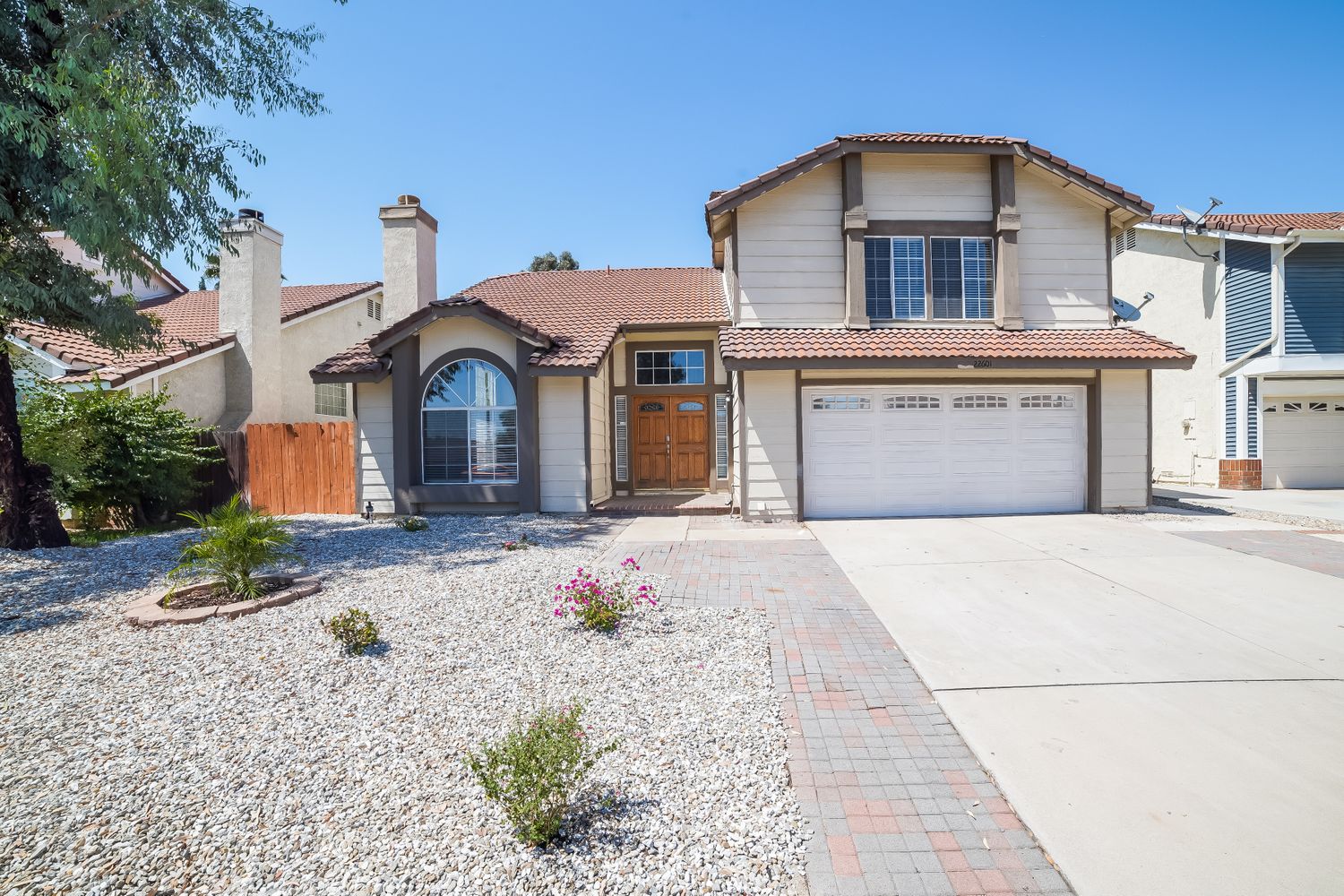 Front of house with two-car garage at Invitation Homes Pasadena.