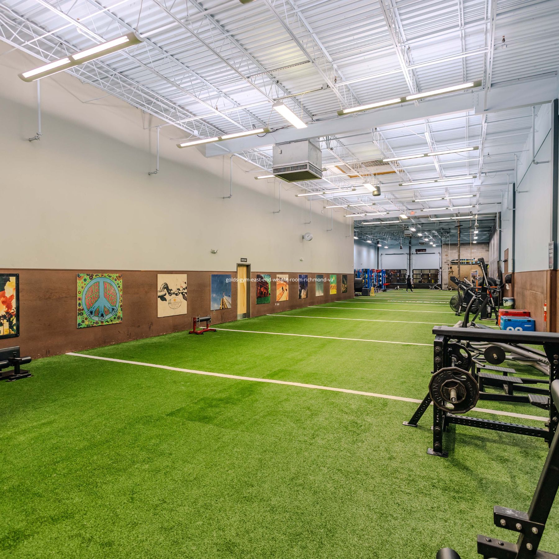 Large open turf and strength training zone at the best gym in Richmond, designed for functional workouts & athletic conditioning.
