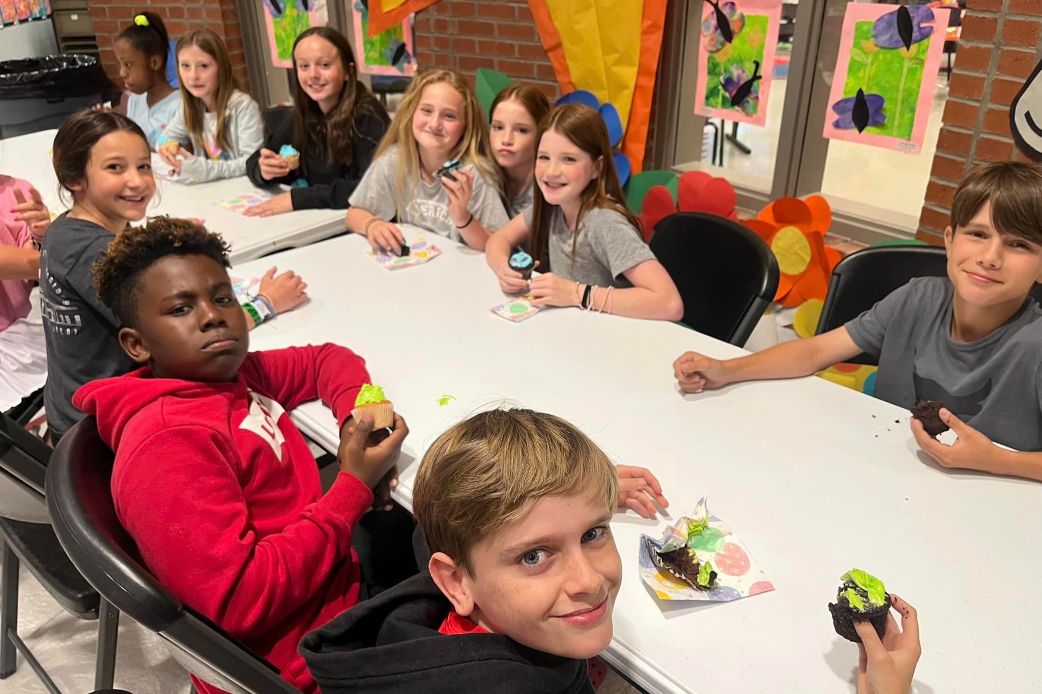 Celebrating the joys of springtime with our future leaders! These young minds are enjoying a delightful treat during our celebration at the local school. It&rsquo;s moments like these that remind us of the importance of community and togetherness.