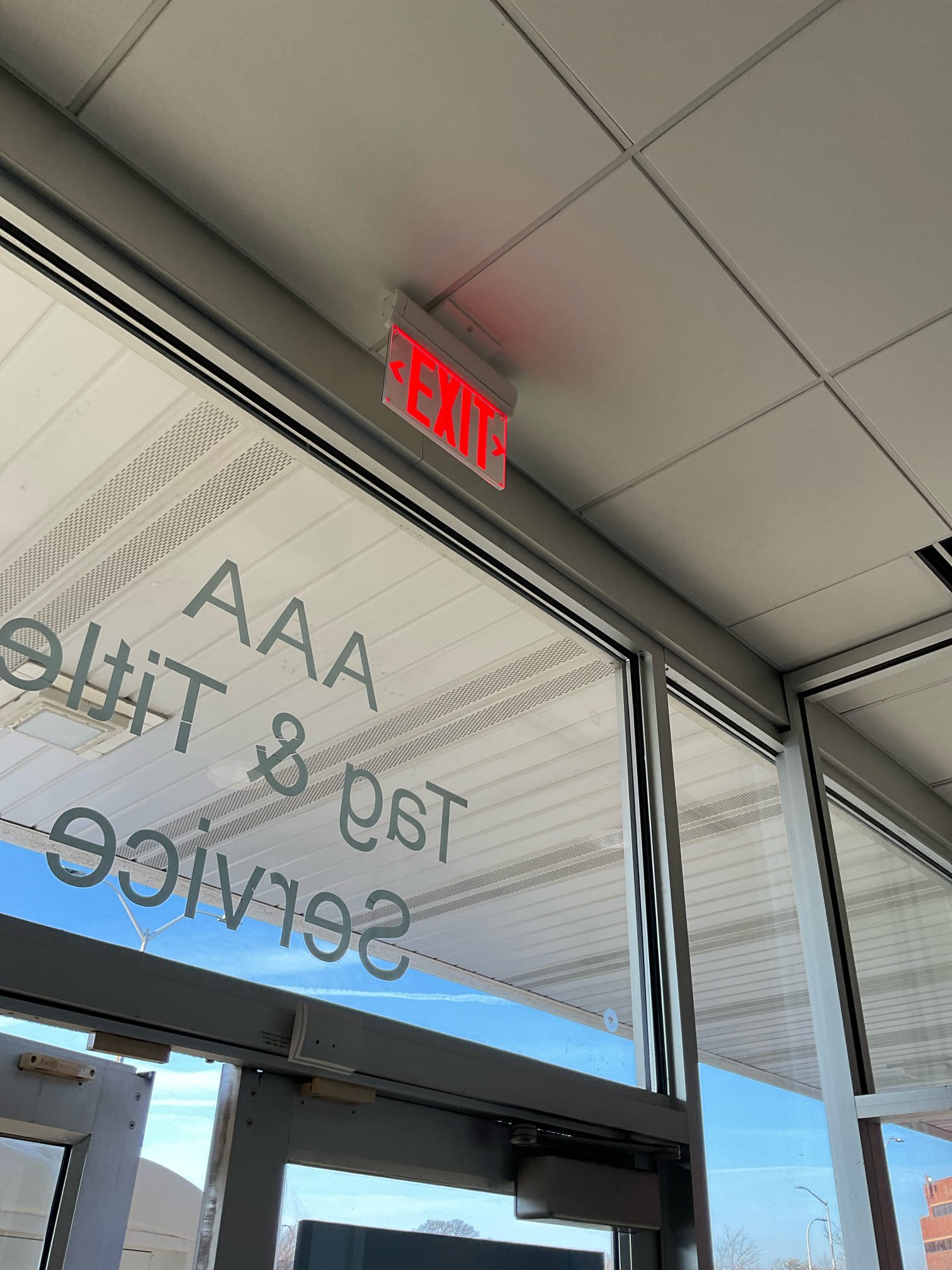 Thomas Edison Electric installed a commercial LED exit sign above the entrance of a Philadelphia, PA business near Cottman Ave. Code-compliant illuminated exit signs are required in commercial spaces to ensure safe egress during emergencies.