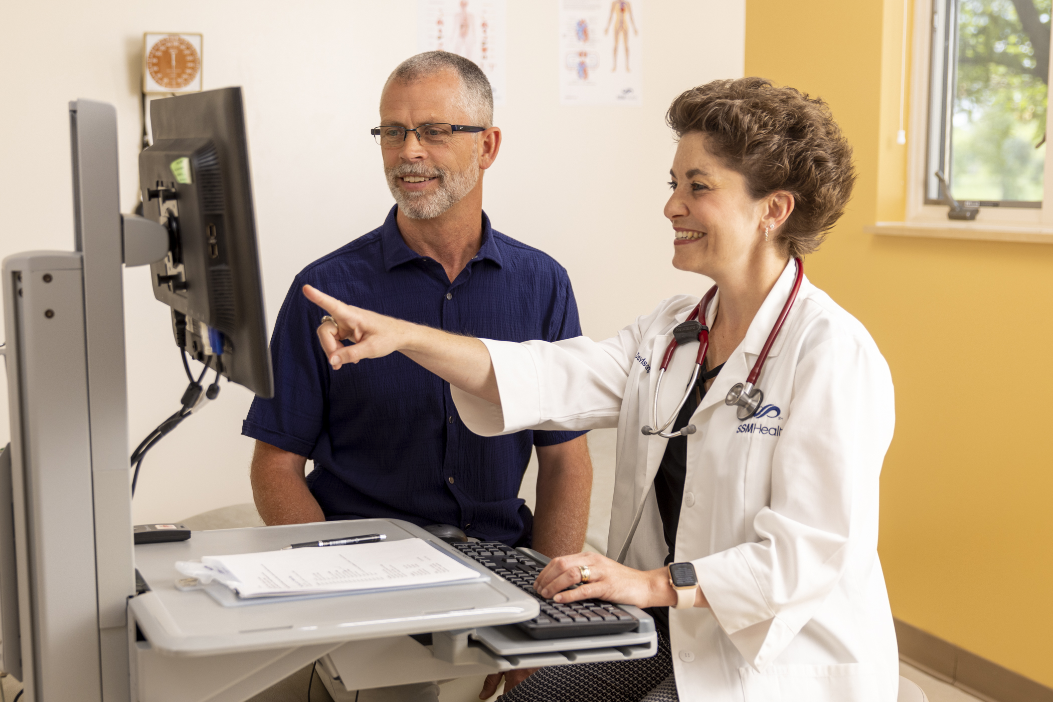Alison Davison, PA, Family Medicine provider at SSM Health in Centralia, IL with an adult male patient.
