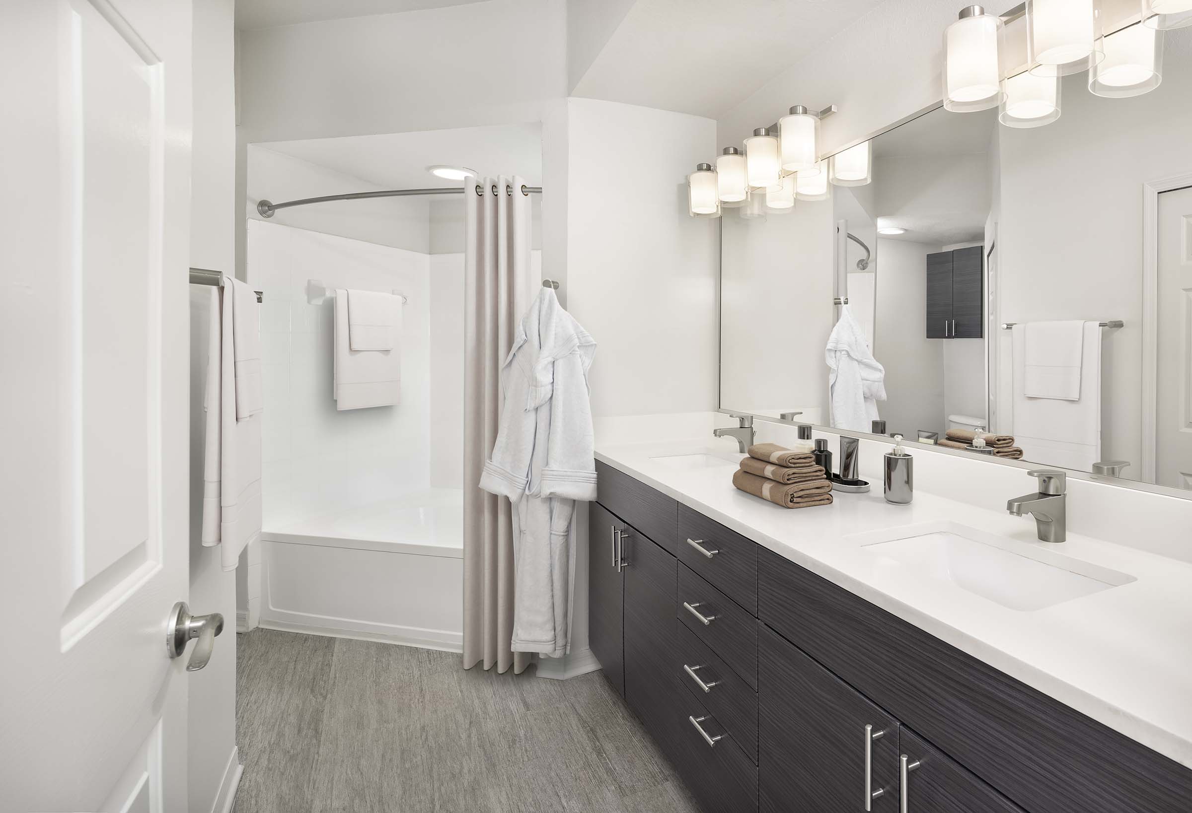 Bathroom with double sink vanity at Camden Lee Vista apartments in Orlando, FL
