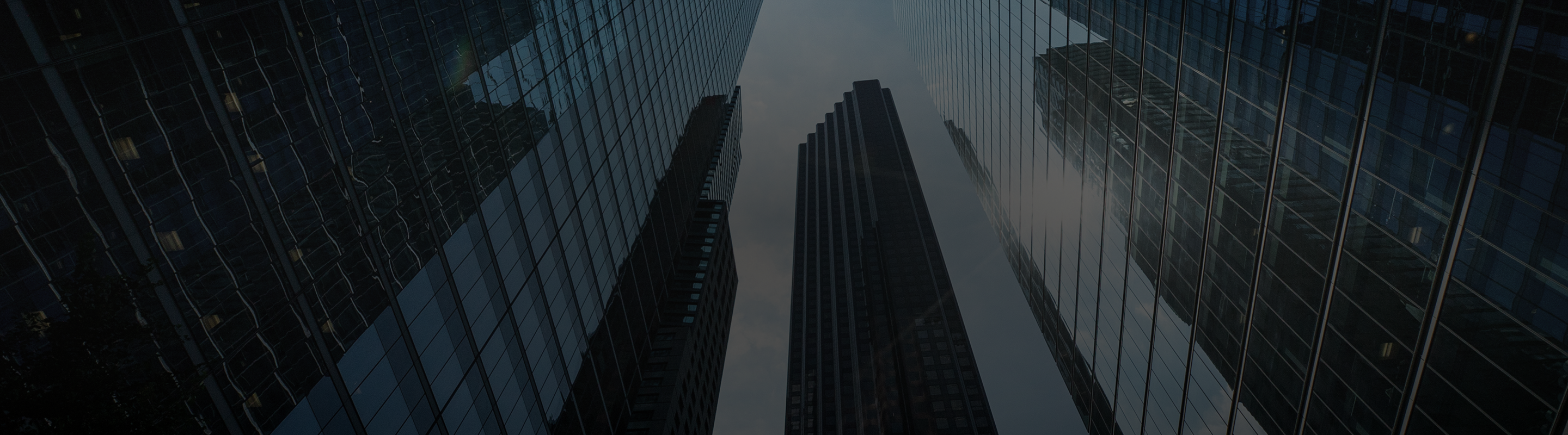 Bottom-up view of skyscrapers.