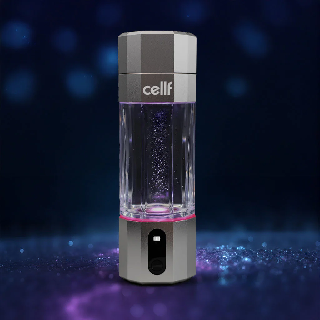 A silver and clear hydrogen water bottle with the logo 'cellf' printed in white on the side is displayed against a dark blue background with purple and blue bokeh lights. The bottle has a faceted design, a clear chamber with bubbles, and a base with a power button and a battery indicator. A pink light emanates from the base of the bottle.