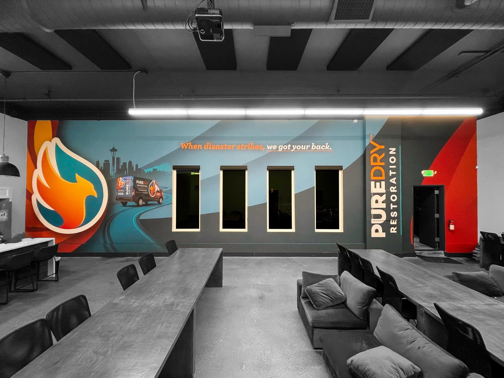 Custom office wall mural for PureDry Restoration, printed and installed on-site by the Ardor Printing crew.
