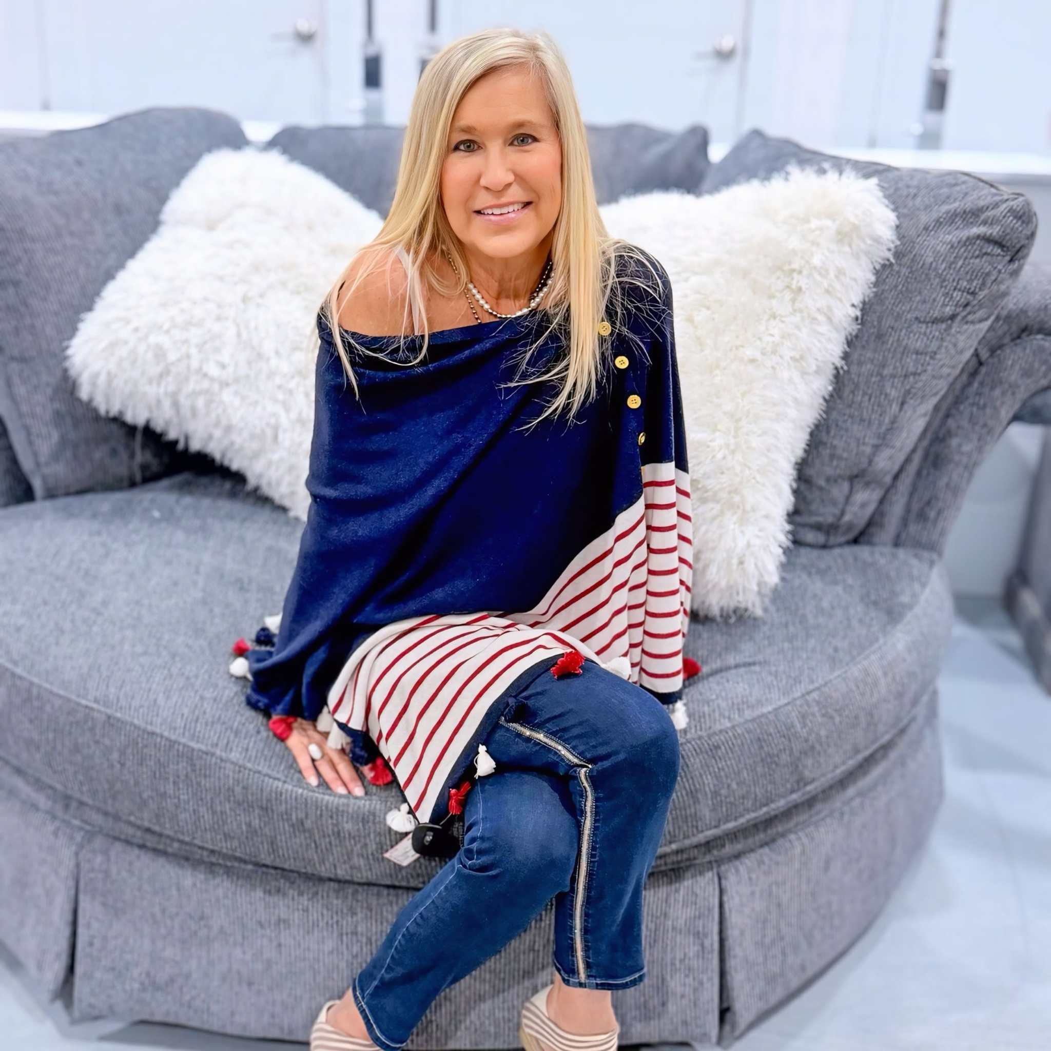Effortlessly chic and easy to wear! This navy striped poncho paired with denim creates a flattering look for brunch, weekends, or casual outings. Visit True Fashionistas before this favorite is gone!