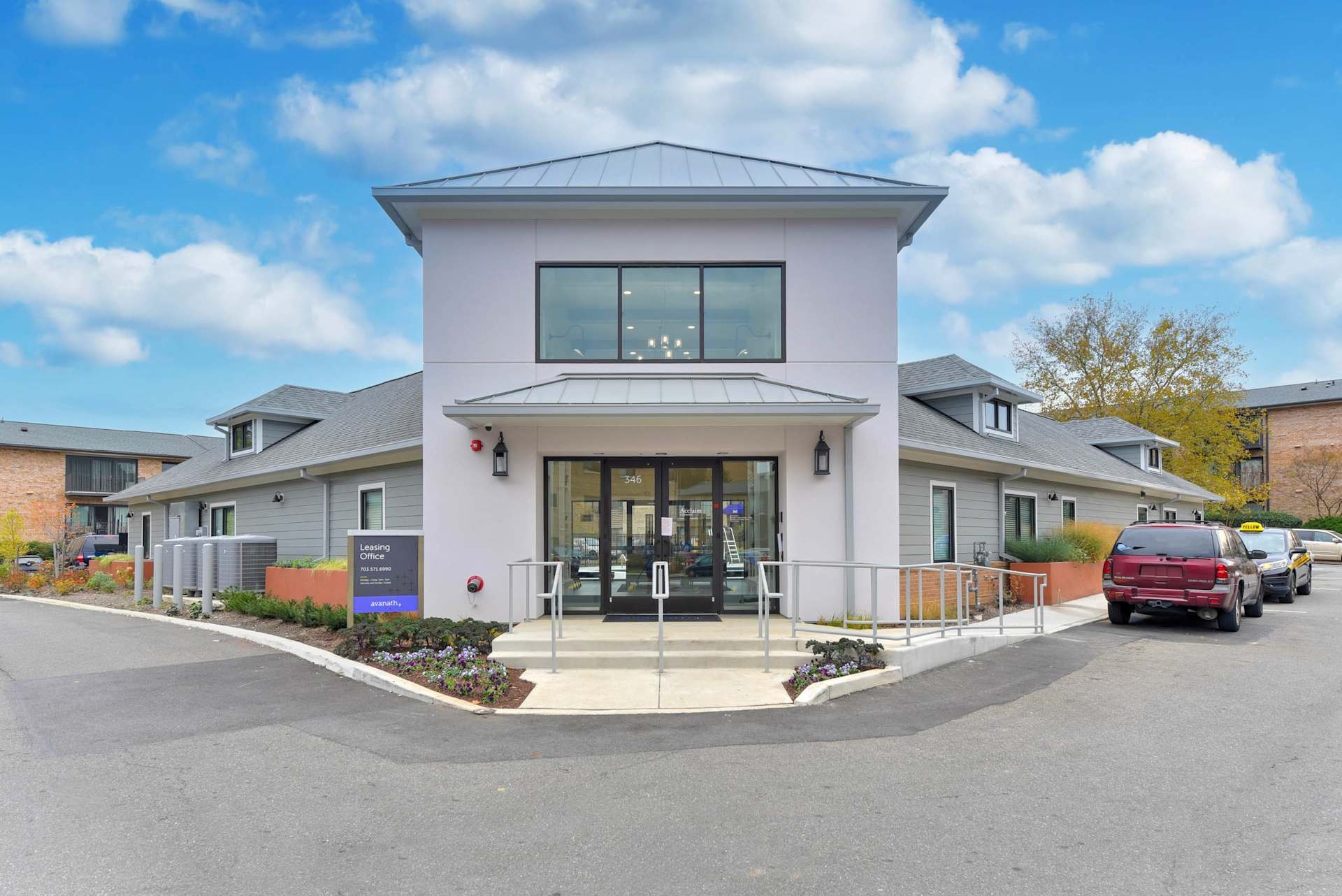 Exterior leasing office with ample parking