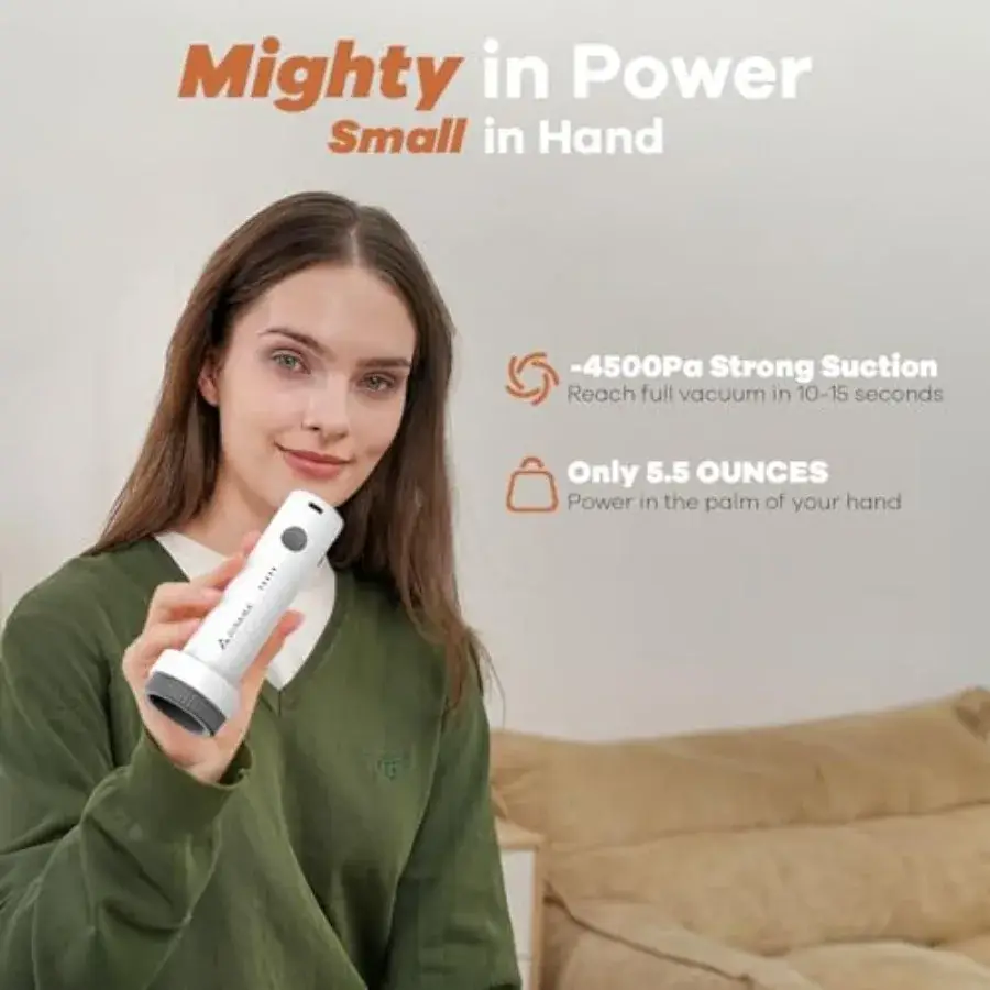A young woman is holding a white handheld vacuum cleaner. She is wearing a green sweater. Text overlay reads 'Mighty in Power, Small in Hand' and highlights the vacuum's suction power and weight. The background appears to be a domestic setting with a couch.