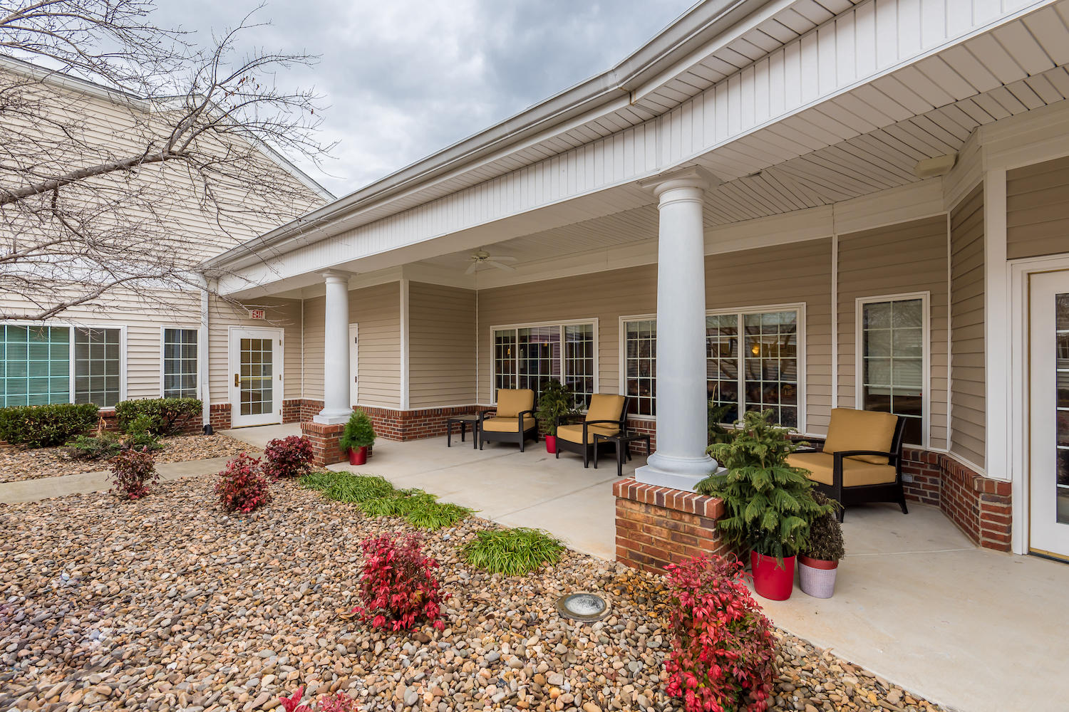 The Neighborhood at Tellico Village covered porch with seating