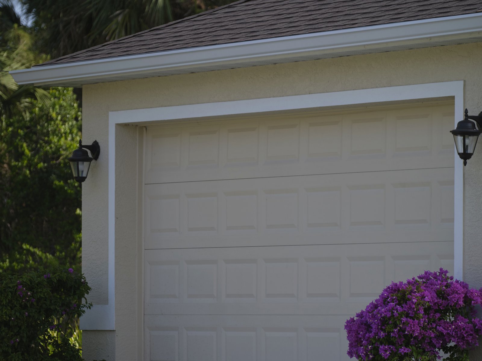 Man Garage Doors & Openers
