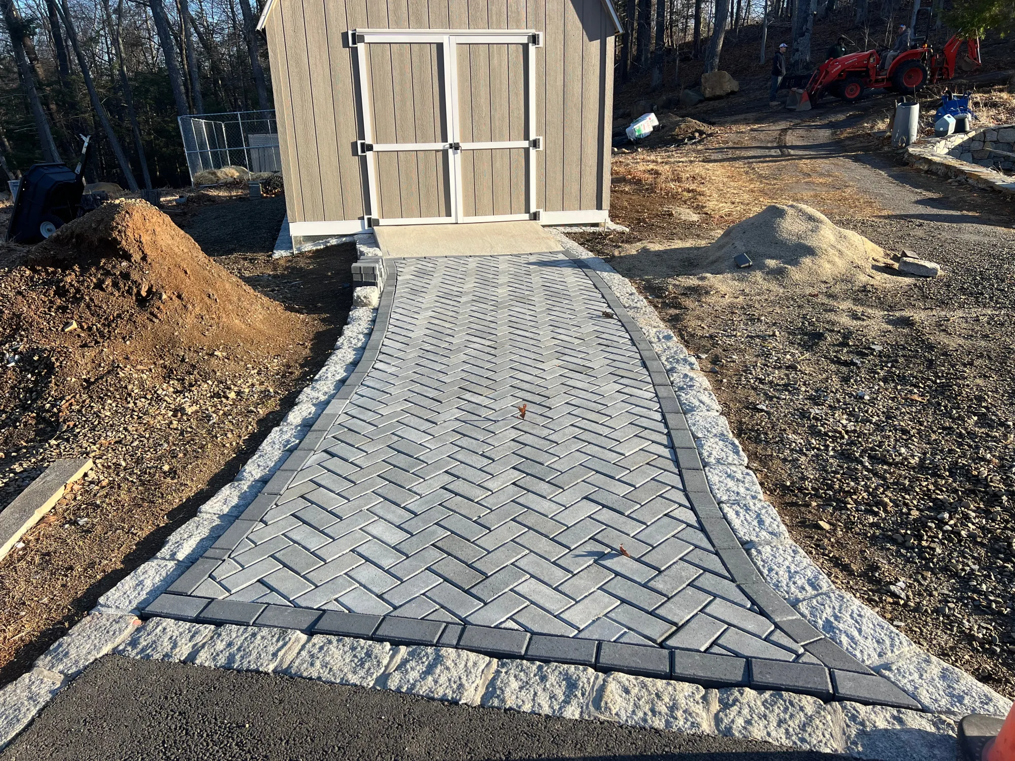 Walkway pavers with lawn surround - Walkways and pathways project by General Masonry LLC.