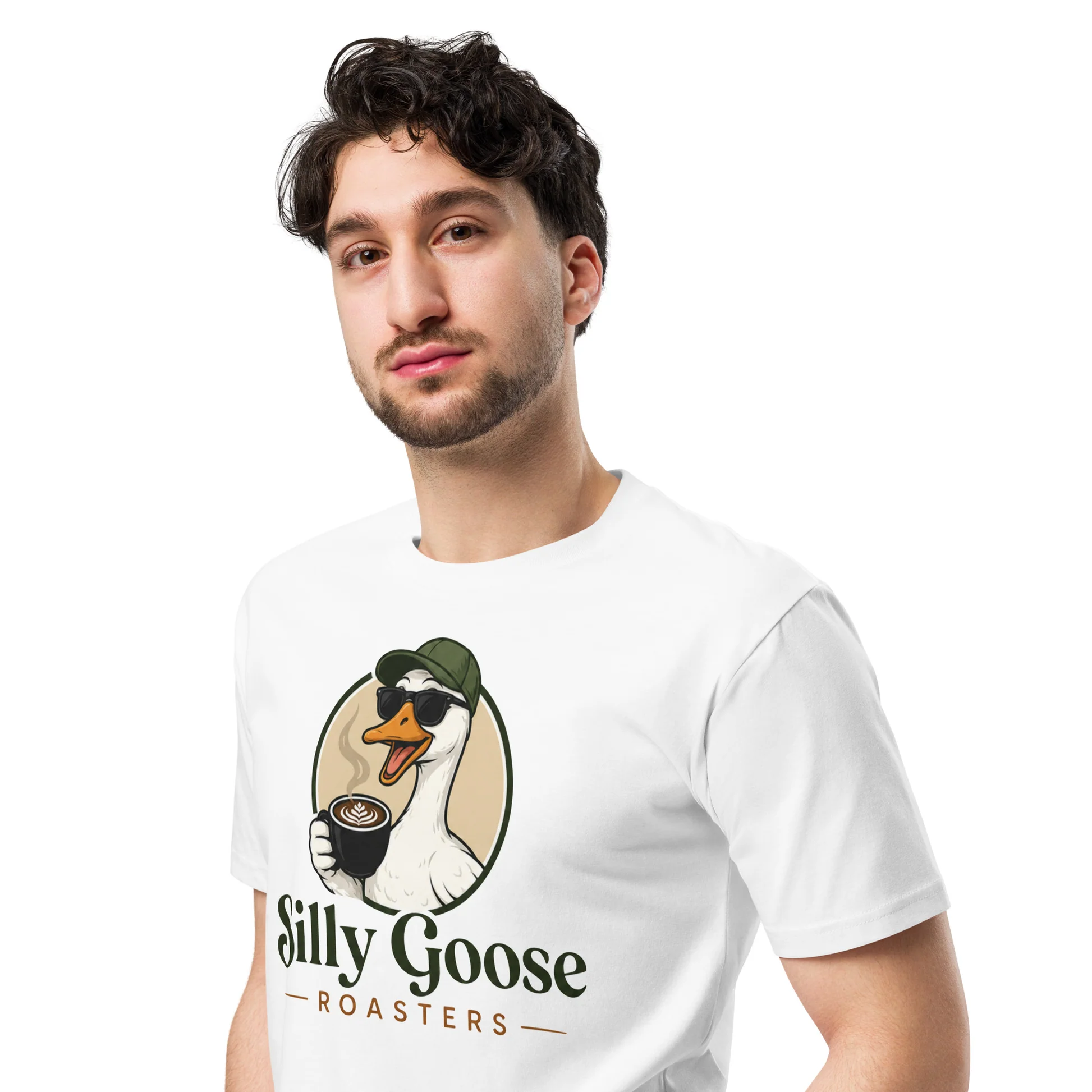 A man wearing a white t-shirt with a "Silly Goose Roasters" logo is pictured against a white background. The logo features a cartoon goose wearing sunglasses and a baseball cap, holding a cup of coffee with latte art. The text "Silly Goose Roasters" is printed below the illustration.
