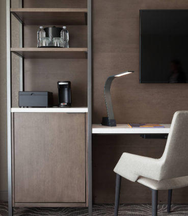 Find comfort and productivity with modern lighting and plenty of plugs and data ports.
