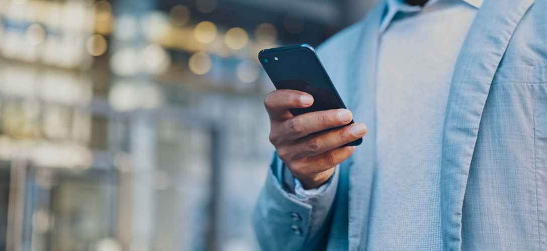 A client accessing their WM Online account on their mobile phone.