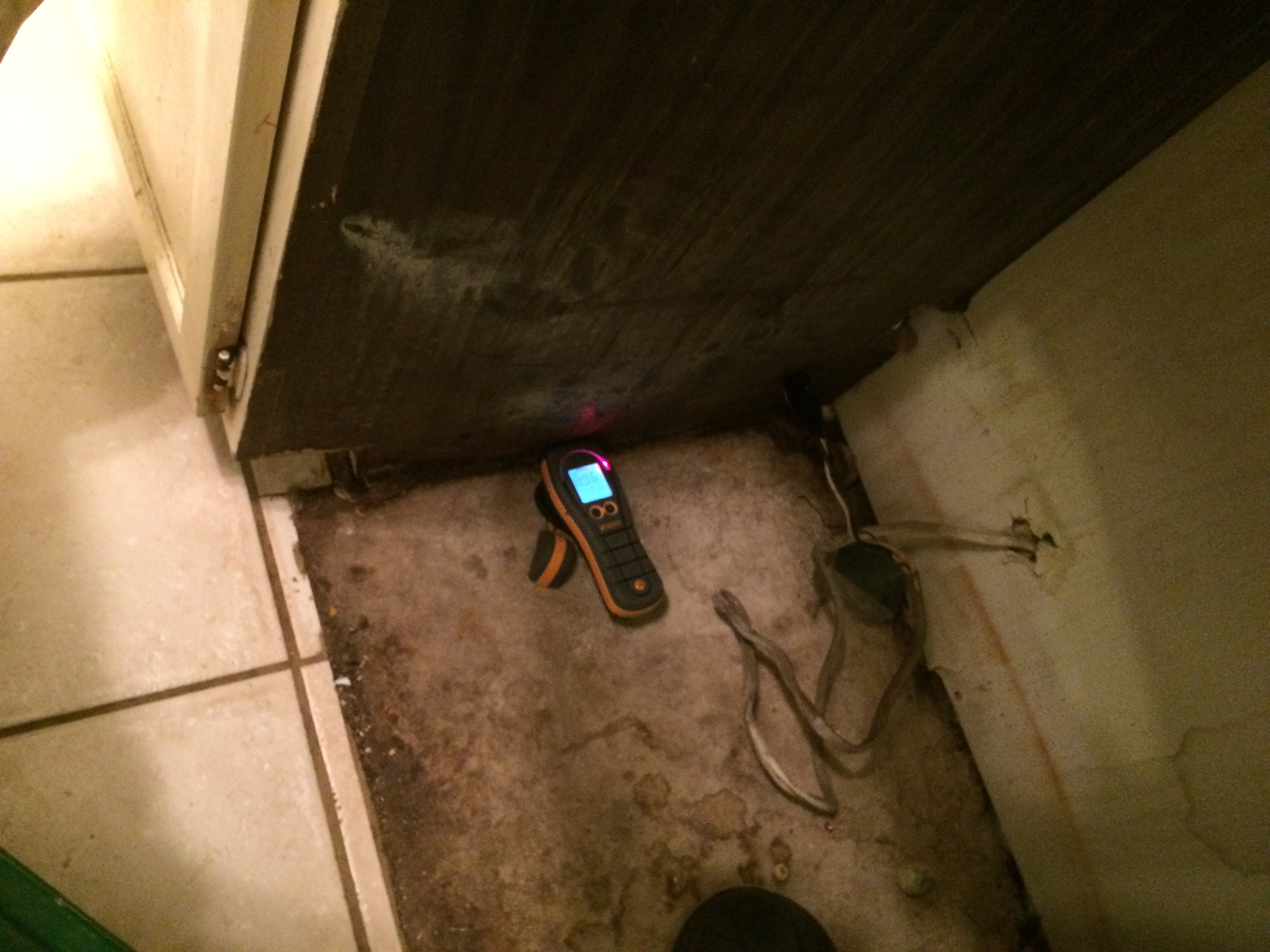 Our SERVPRO team checking moisture levels.