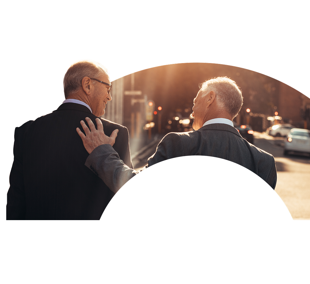 Business people walking down a sunlit street displayed in the curve of a large letter O.
