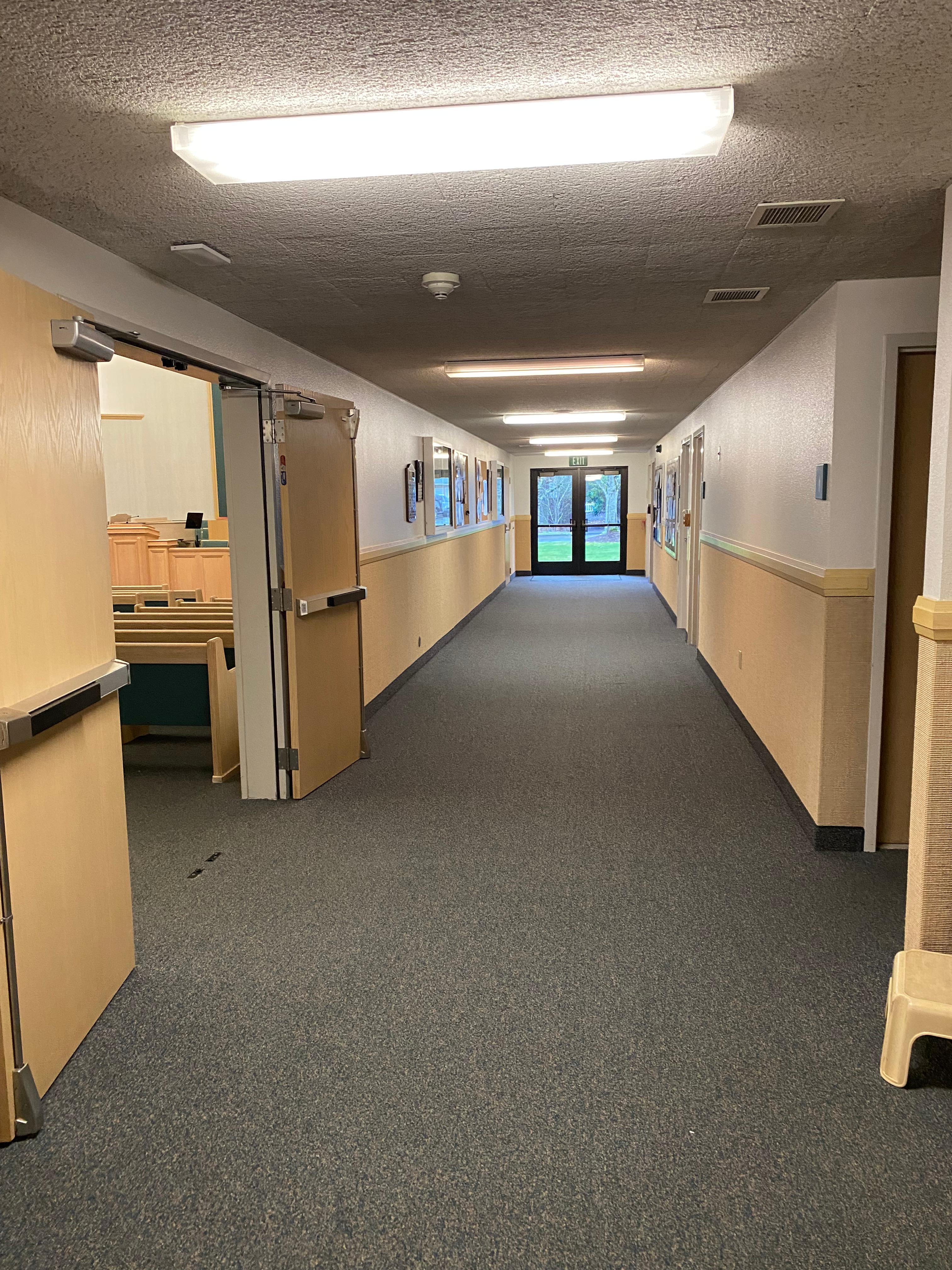 A hallway leading to classrooms, bathrooms, etc.