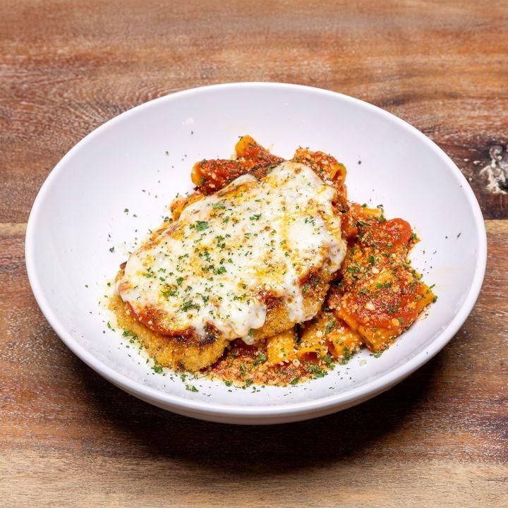 Parmesan-crusted boneless chicken | Covered in our homemade marinara | Topped w/fresh mozzarella che 