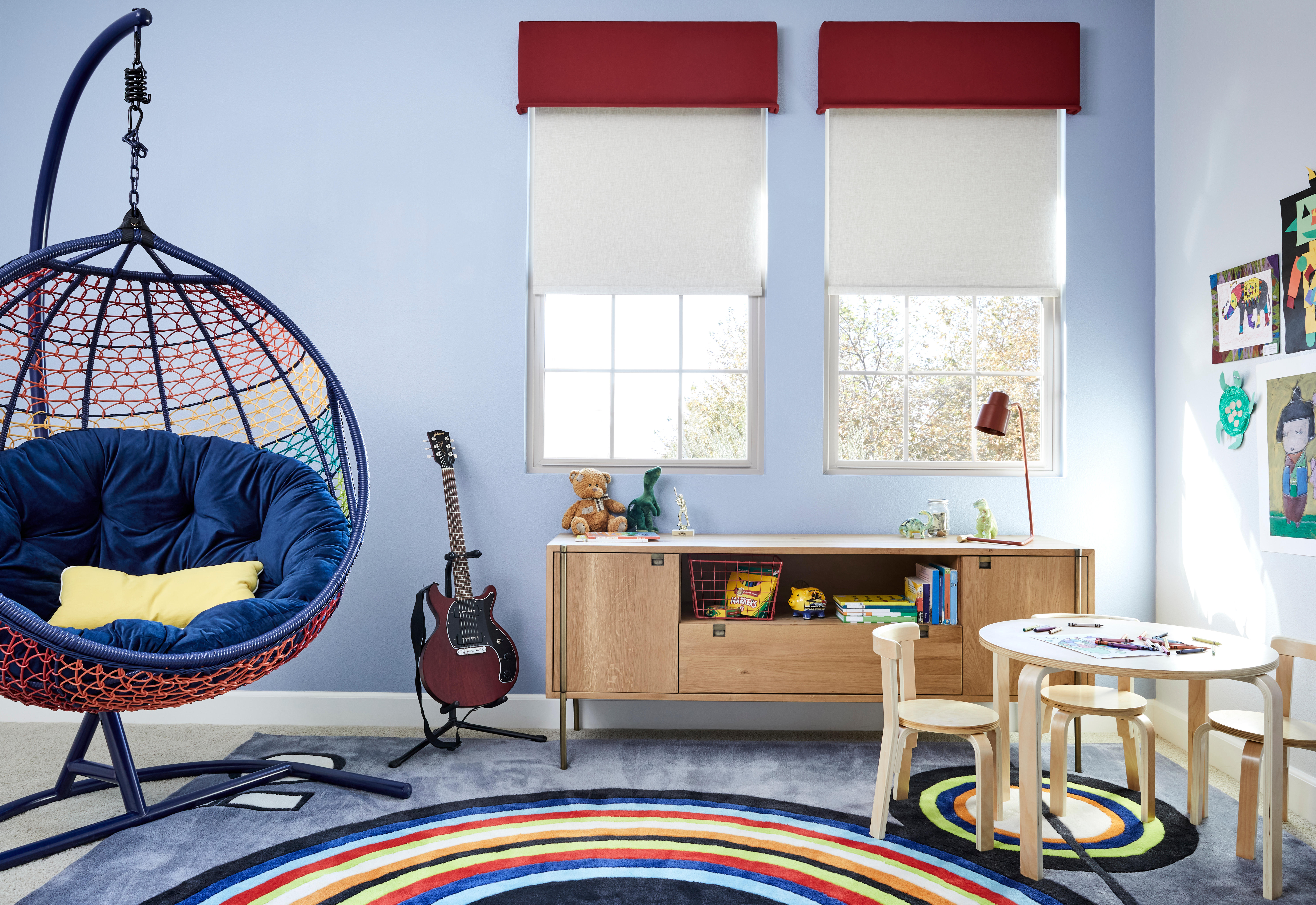 Roller Shades offer a modern, chic look while providing your living space with the perfect amount of light. The highly curated shades from Budget Blinds of Rockwall, Terrell, and Greenville come in a variety of colors to fit any space.