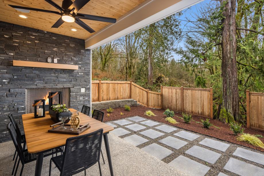 Covered outdoor patio with a gas fireplace