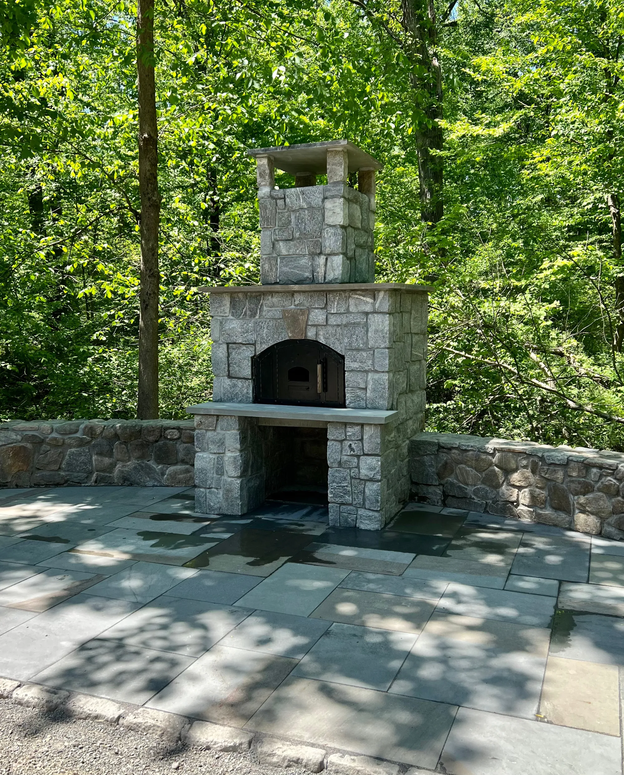 Stone fireplace and accent wall - Fireplaces project by General Masonry LLC.