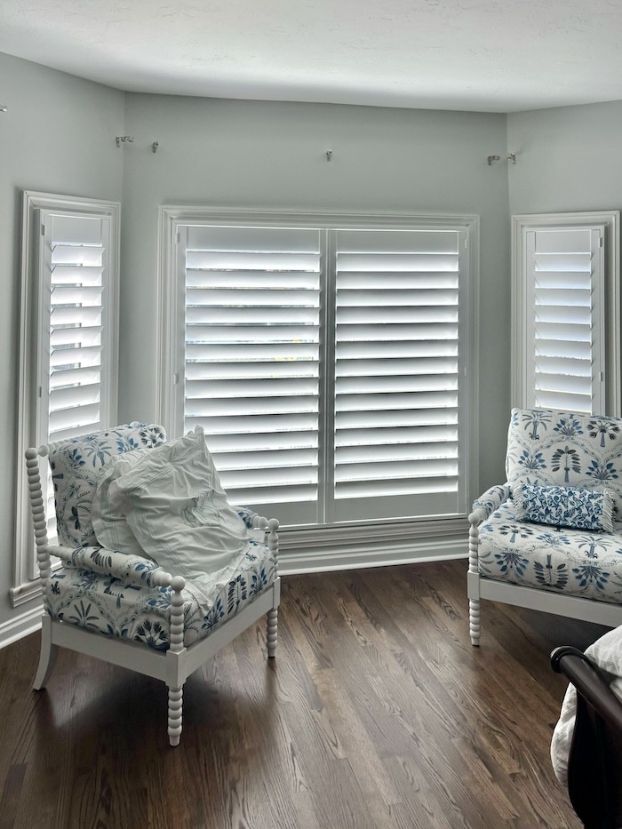 Here on the Treasure Coast, we love coastal style! Notice how these timeless shutters add depth and dimension to this local Vero Beach living space, while adding privacy and UV protection to the furniture and flooring.
