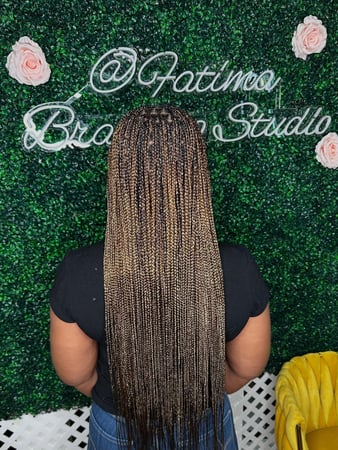 Images Fatima Braiding Studio