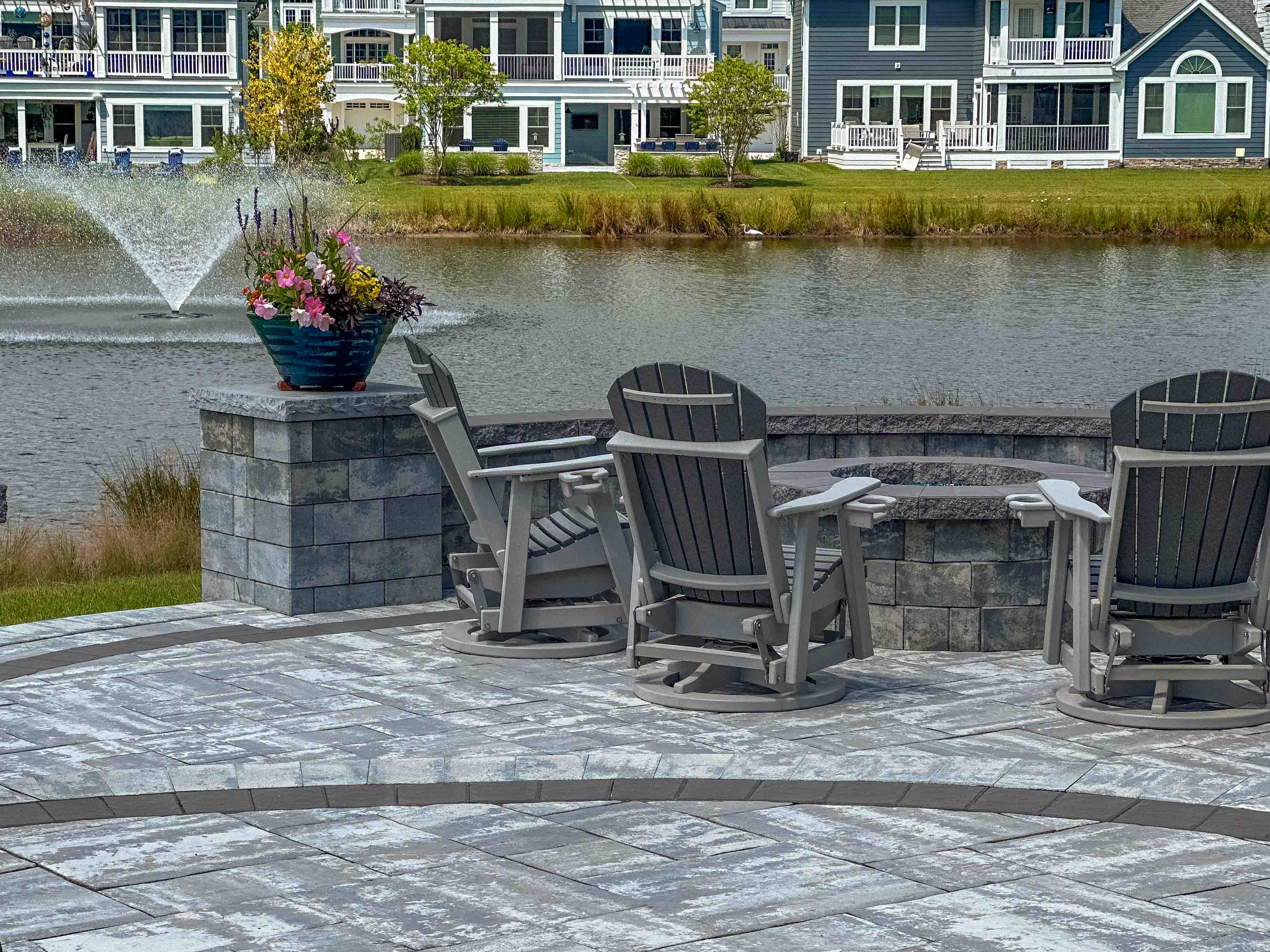 Elevate your outdoor living with stunning paver patios, inviting outdoor lounging spaces, and cozy fire pits. Discover the perfect blend of style and functionality for your backyard oasis with our expert hardscaping services.