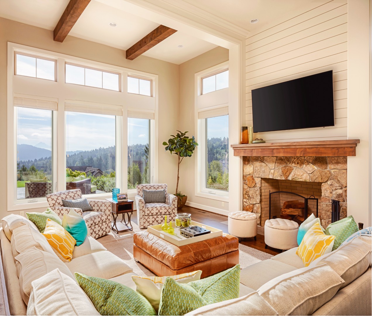 The EcoTek 1200 - 2200 Series Casement Windows in this great room create a seamless indoor and outdoor connection, allowing abundant natural light to flood the space. The sleek window design complements the warm, earthy tones of the room’s décor, enhancing the bright and airy atmosphere while providing stunning views of the surrounding landscape.