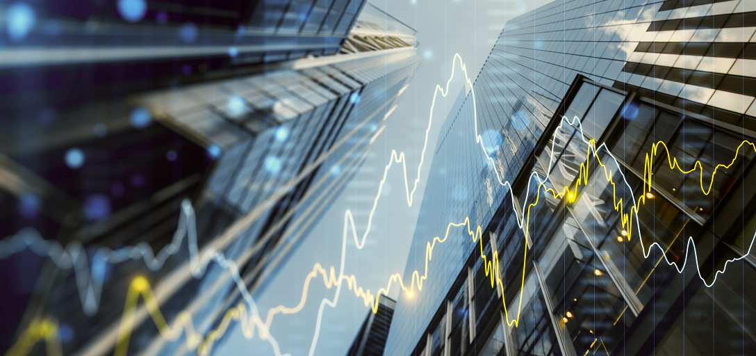 A bottom-up view of buildings in the financial district with a graphic overlay of the financial markets.