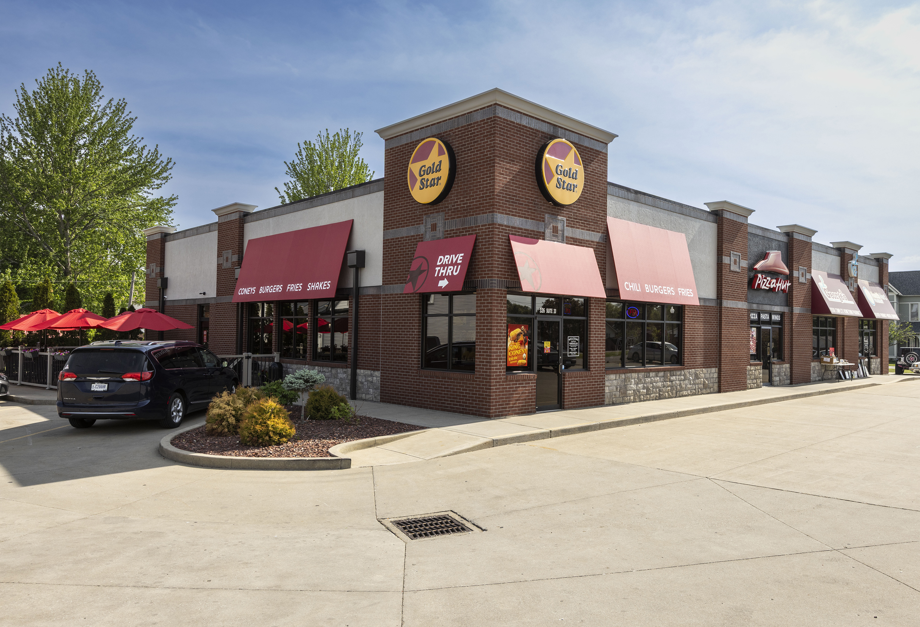 Gold Star Versailles's newly remodeled exterior, including drive-thru.