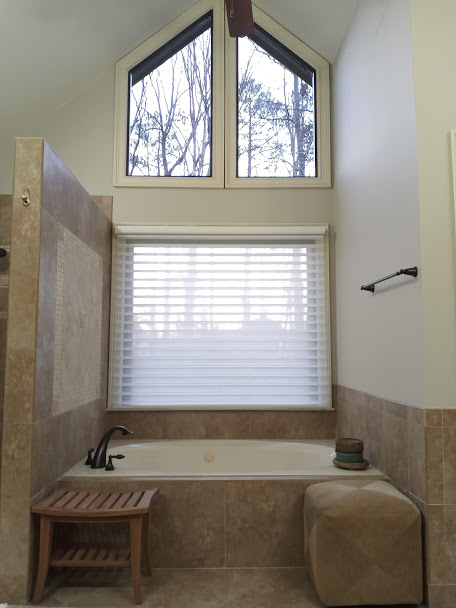 Window Shadings are an elegant look for your window. They allow you to control the level of privacy and exterior view, with a soft look. Here in this bathroom, privacy was a concern but also maintaining the view to their spacious backyard. We were able to provide the perfect window treatment