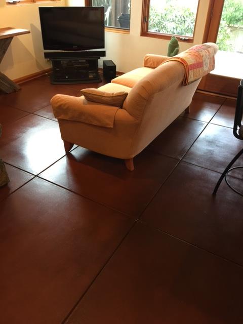Interior resurfaced and stained living room floor