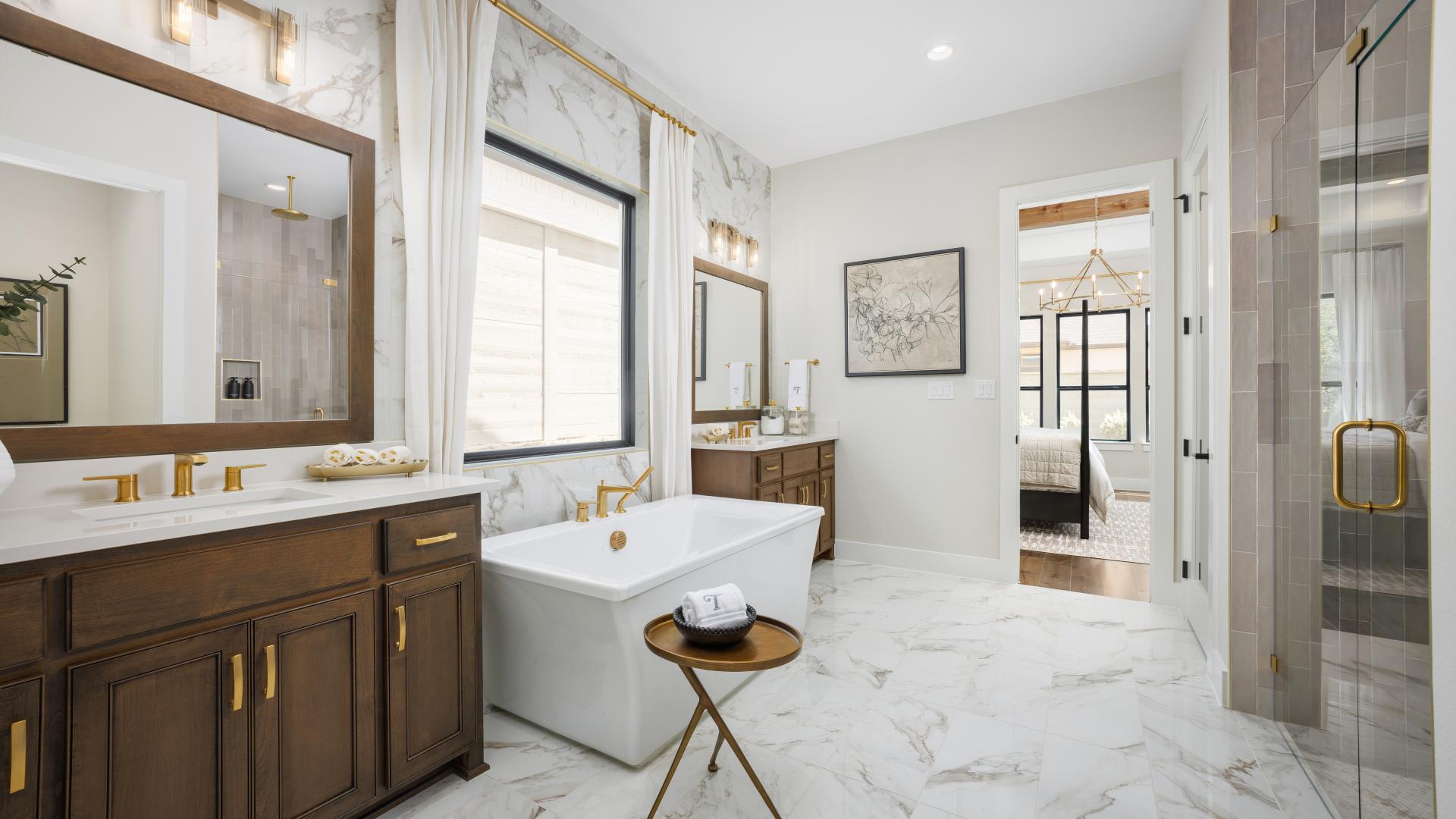 Luxe primary baths with large soaking tubs 