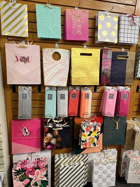 Our gift wrap has just been replenished. Lots of new cute designs!!