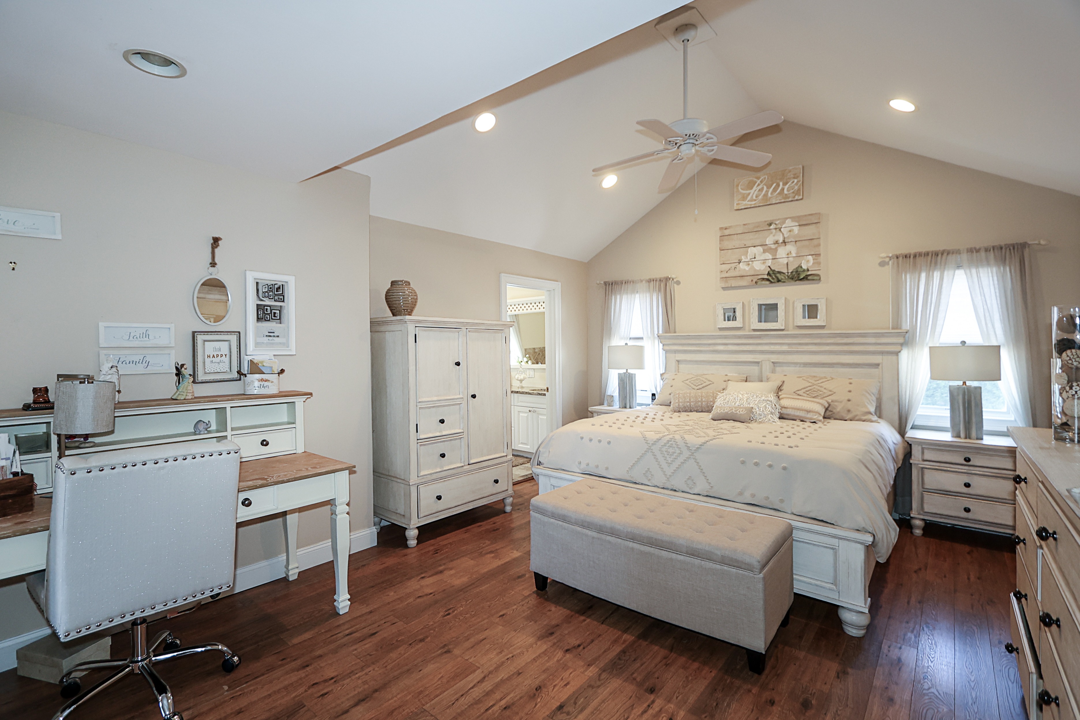 Elegant primary bedroom with ensuite bath, designed for relaxation and style. Presented by The Vogler Team &ndash; Long Island real estate advisors.