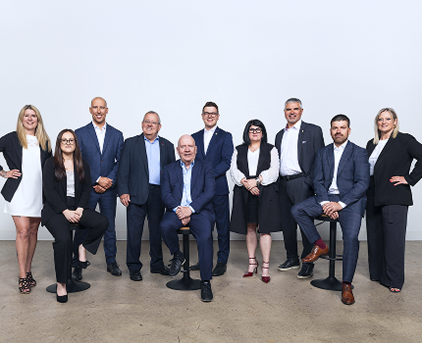 A group shot of The Colbert Group.