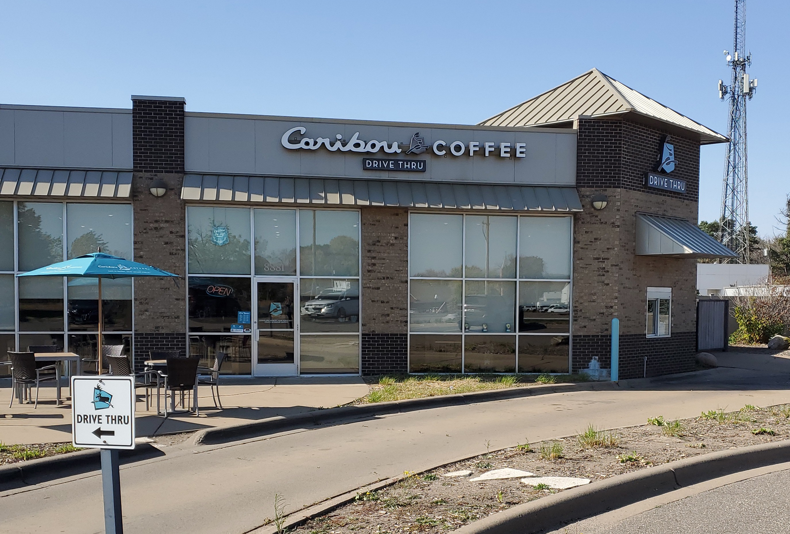 Storefront of the Caribou Coffee at 8881 Jefferson Highway in Osseo