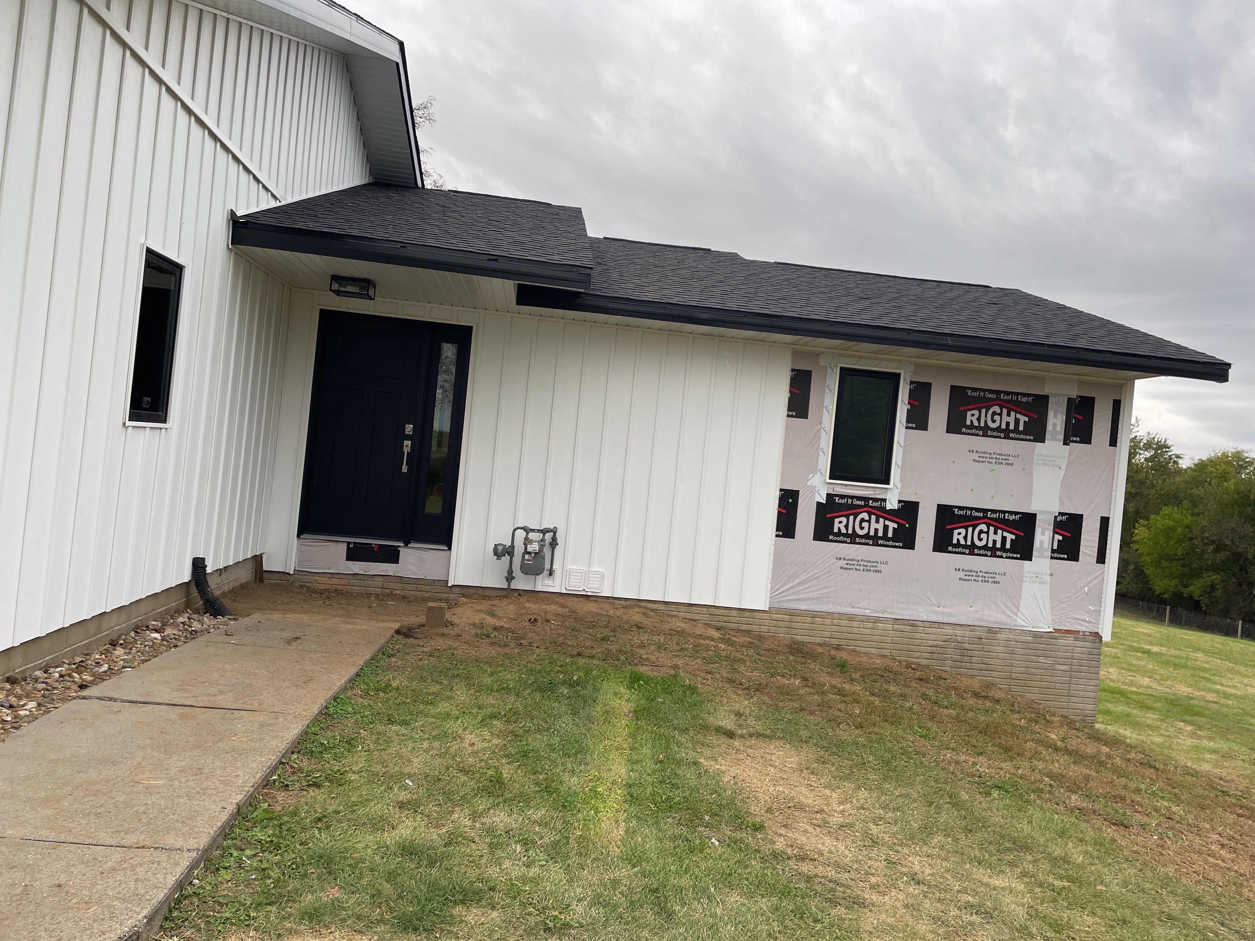 Craneboard Vinyl Siding Installation with Soffit and Fascia in Pella, IA