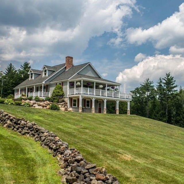 Sprawling beautiful 4 bedroom farmhouse in Alfred Maine with large detached barn, gorgeous views and acres of land