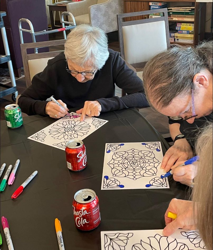 Summer is here! Our craft project was stained glass window clings that will be beautiful on the windows!