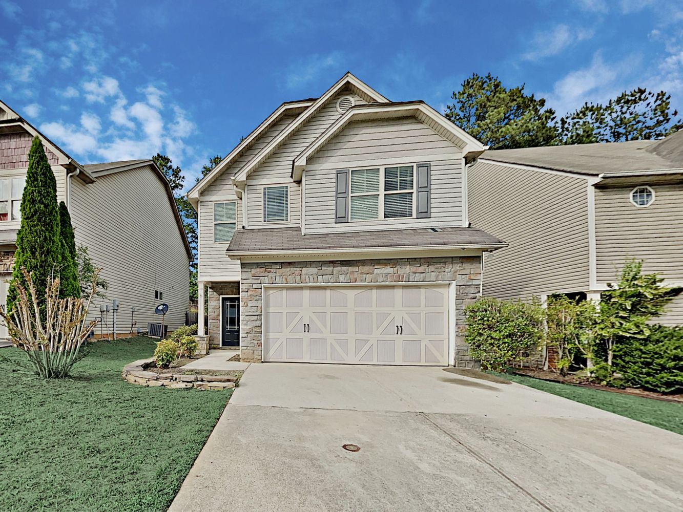 Beautiful home with a two-car garage at Invitation Homes Atlanta.