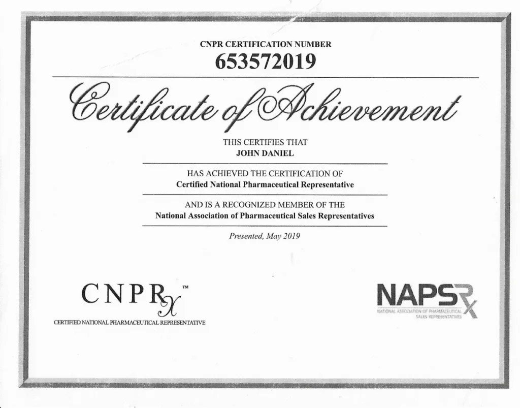 This is a "Certificate of Achievement" presented to John Daniel for achieving the certification of Certified National Pharmaceutical Representative and being a recognized member of the National Association of Pharmaceutical Sales Representatives. The certificate was presented in May 2019 and features the logos for CNPR and NAPS Rx.