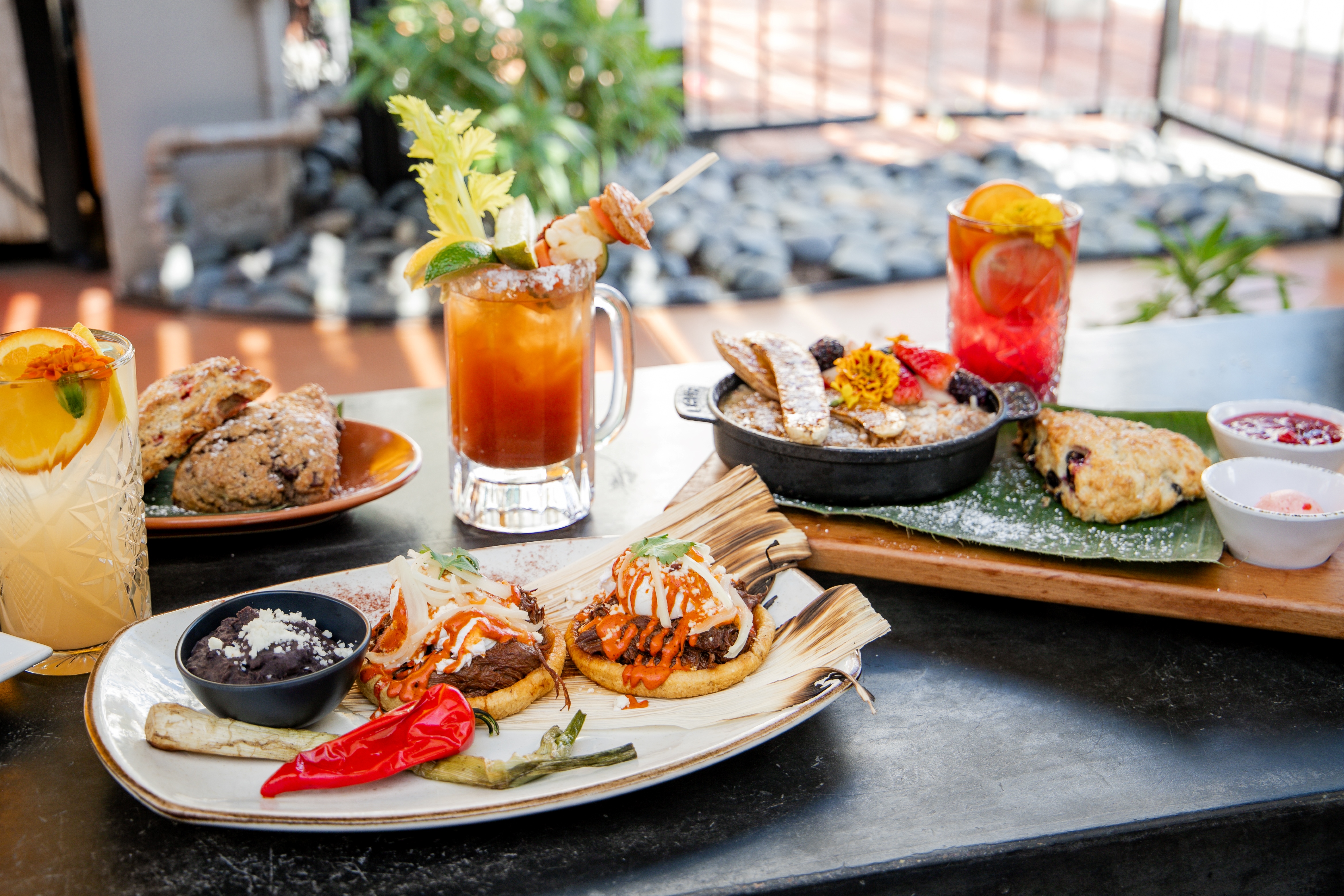 Enjoy brunch alfresco in our garden every Saturday and Sunday. Savor our housemade pan dulce, sip on refreshing brunch cocktails, and relax on our sun-soaked patio.