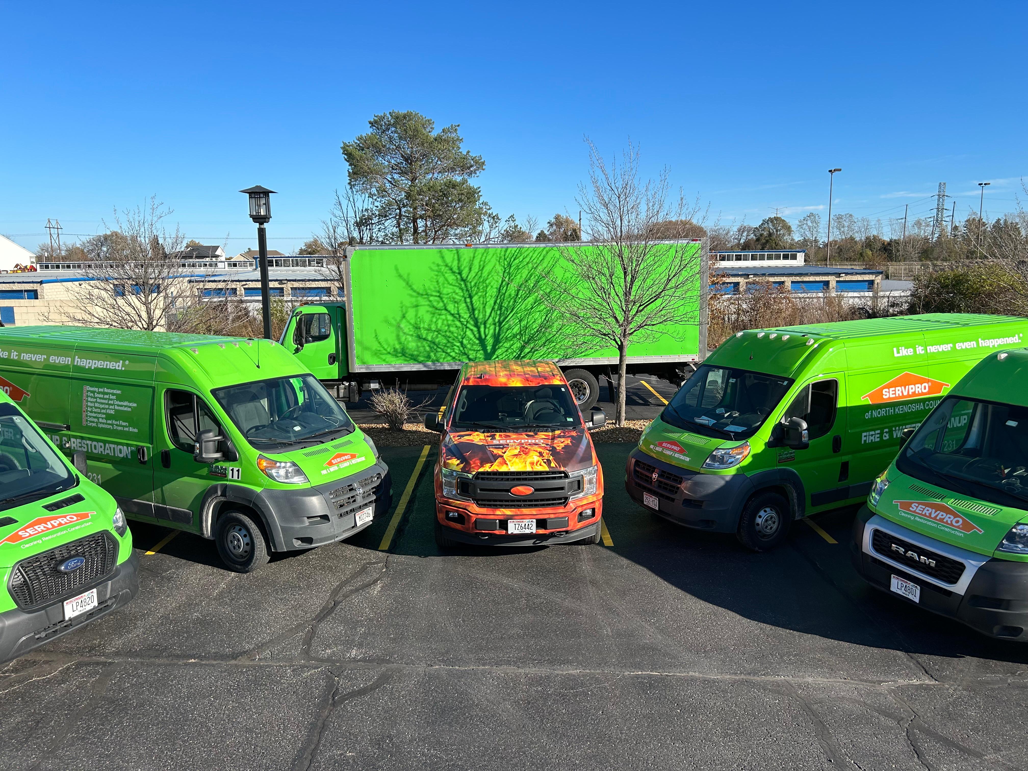 Showing 6 SERVPRO vehicles side by side