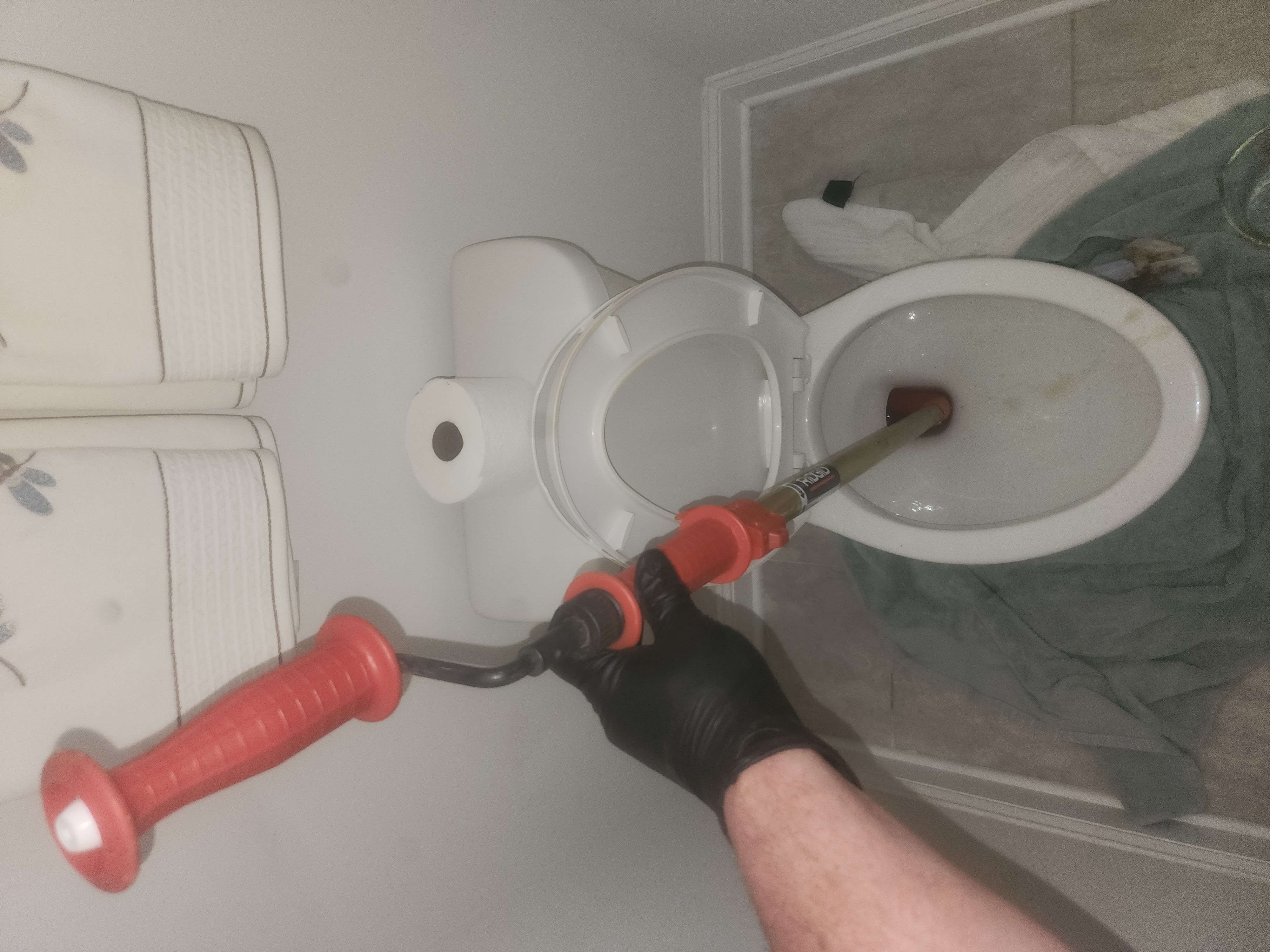 Toilet clearing in progress. 