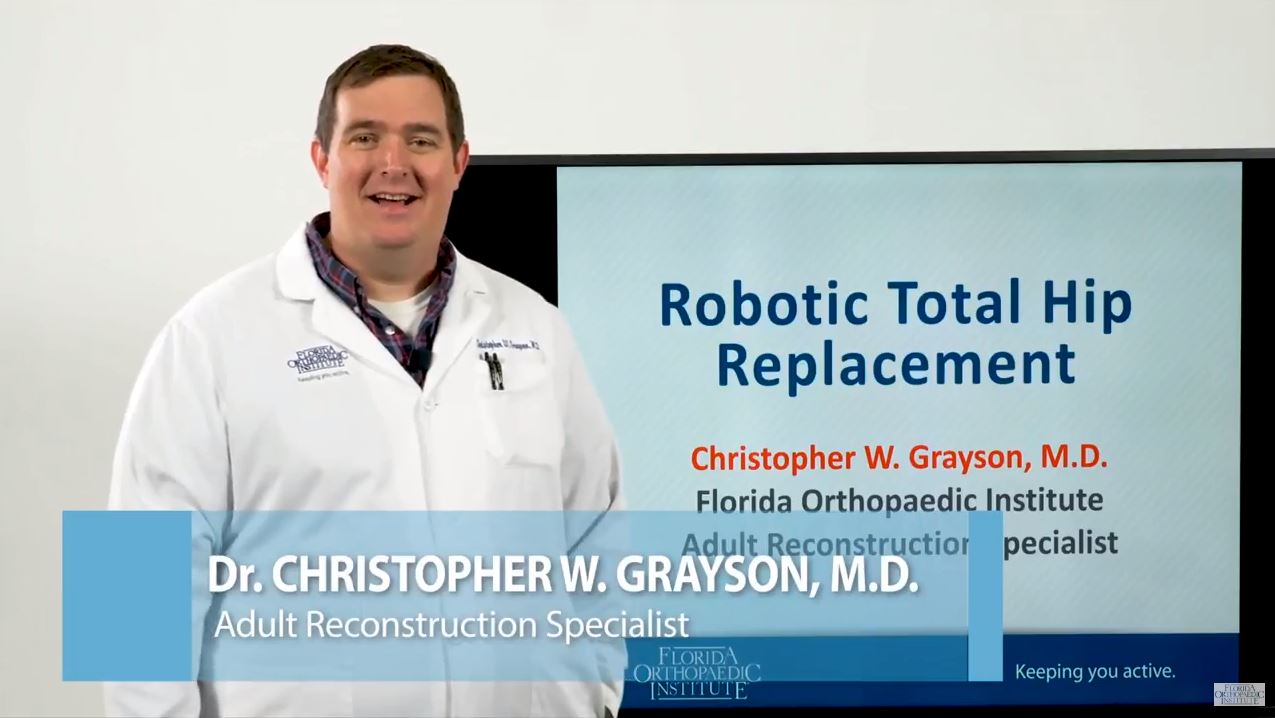 Dr. Grayson Presenting Information on Robotic Total Hip Replacement