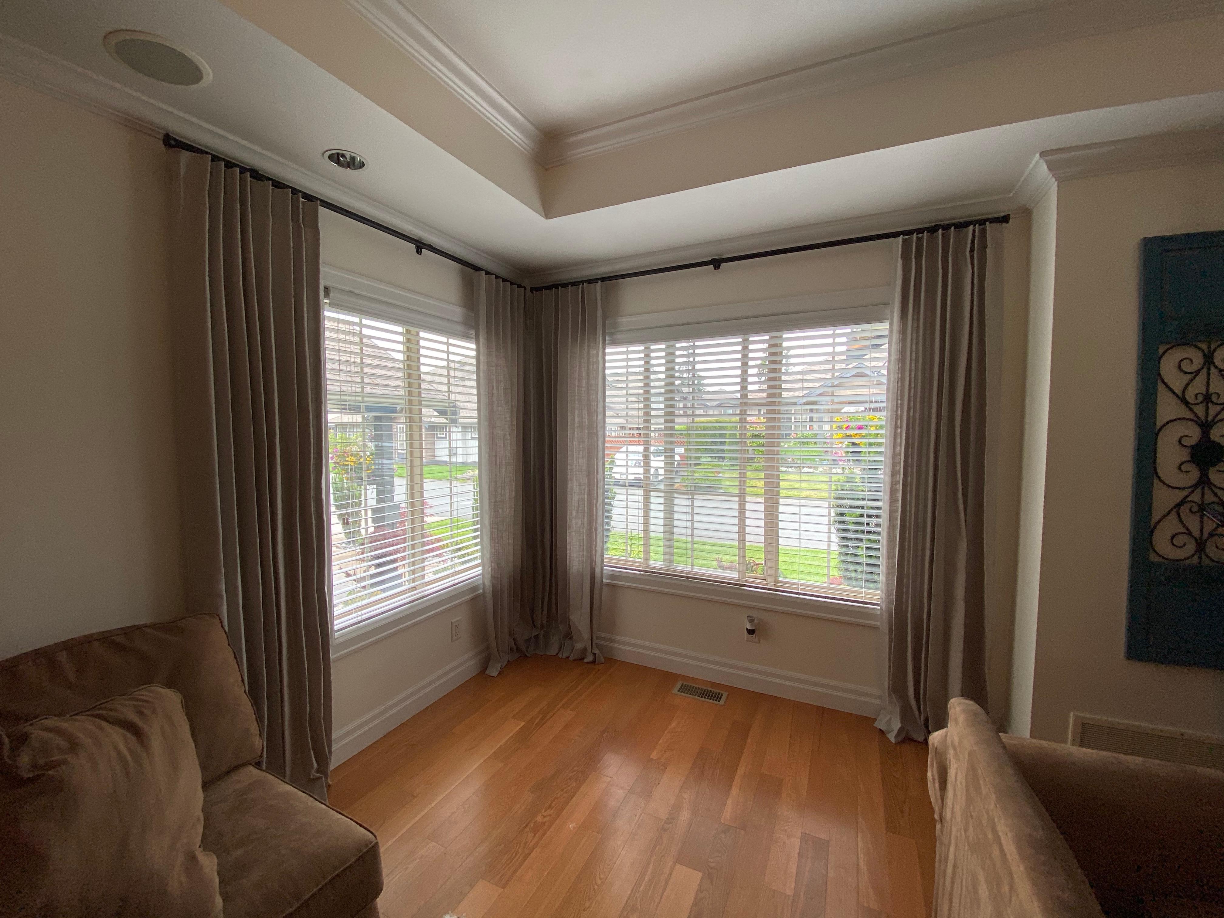 Beautiful pinch pleat drapery was added to frame these windows! Budget Blinds of Chilliwack, Hope and Harrison Chilliwack (604)824-0375