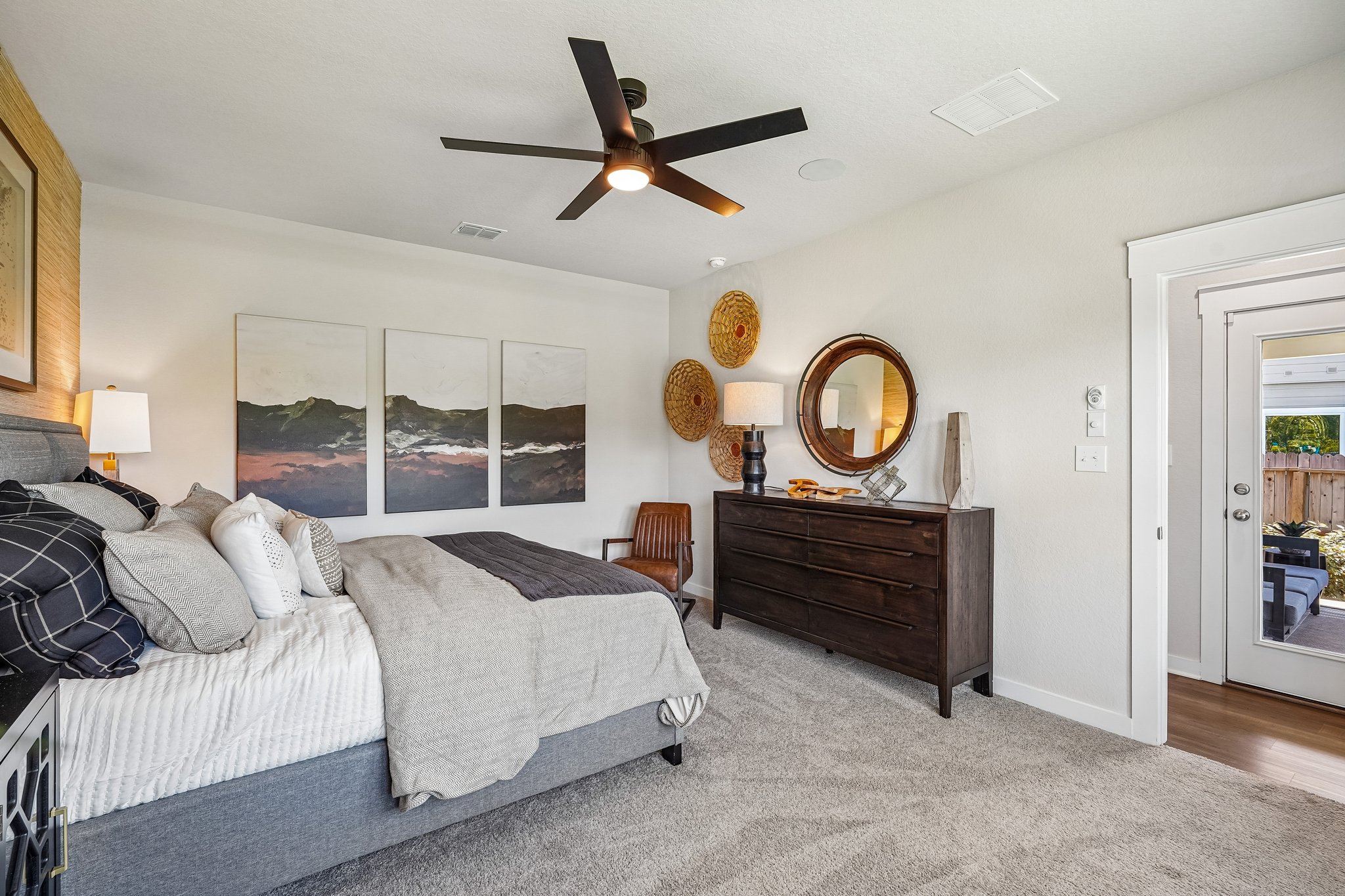 Spacious Rear-Positioned Owner’s Suite Featuring Ceiling Fan and Privacy 