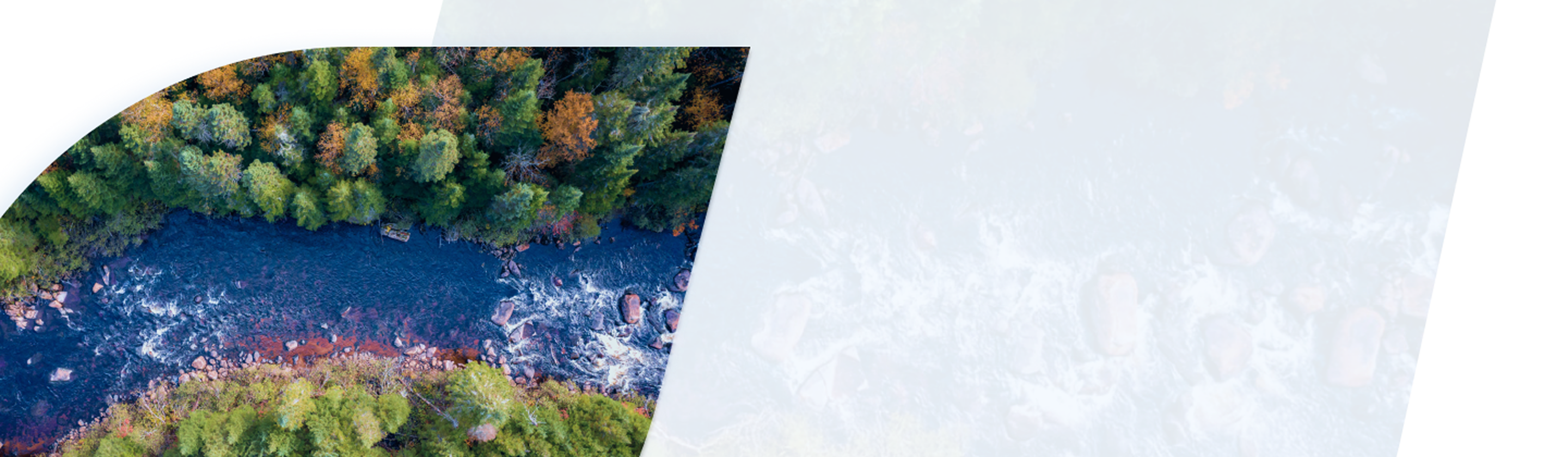 An aerial view of a green boreal forest and river in Quebec.